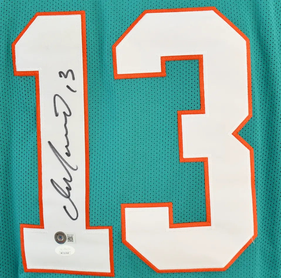 Dan Marino Signed Dolphins Jersey.Certified by BECKETT and PSA/DNA authentic-signatures