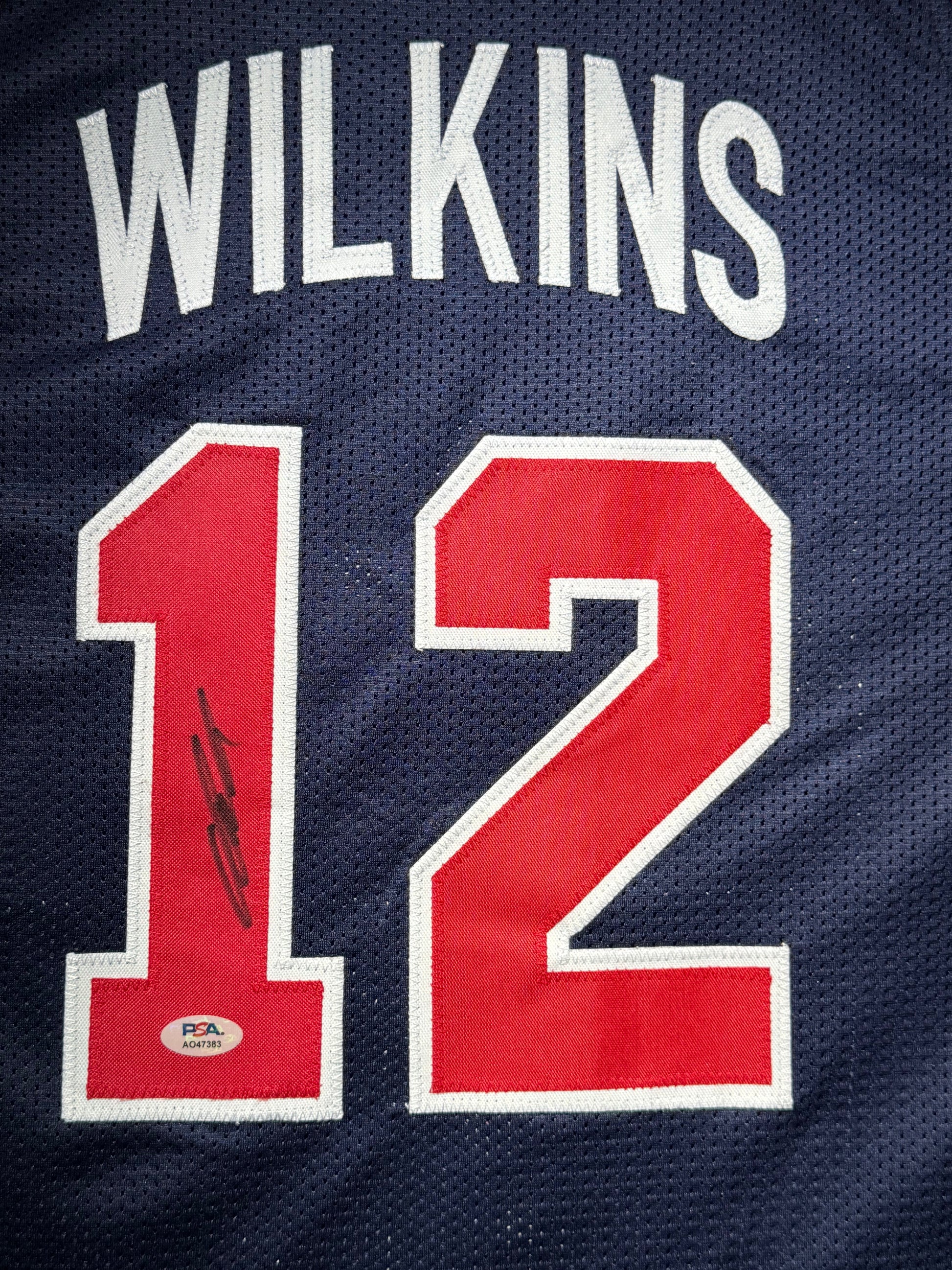 Maillot Custom Exterieur Team USA Edition Championnat du Monde FIBA 1994 signe par Dominique Wilkins et certifie par PSA authentic-signatures