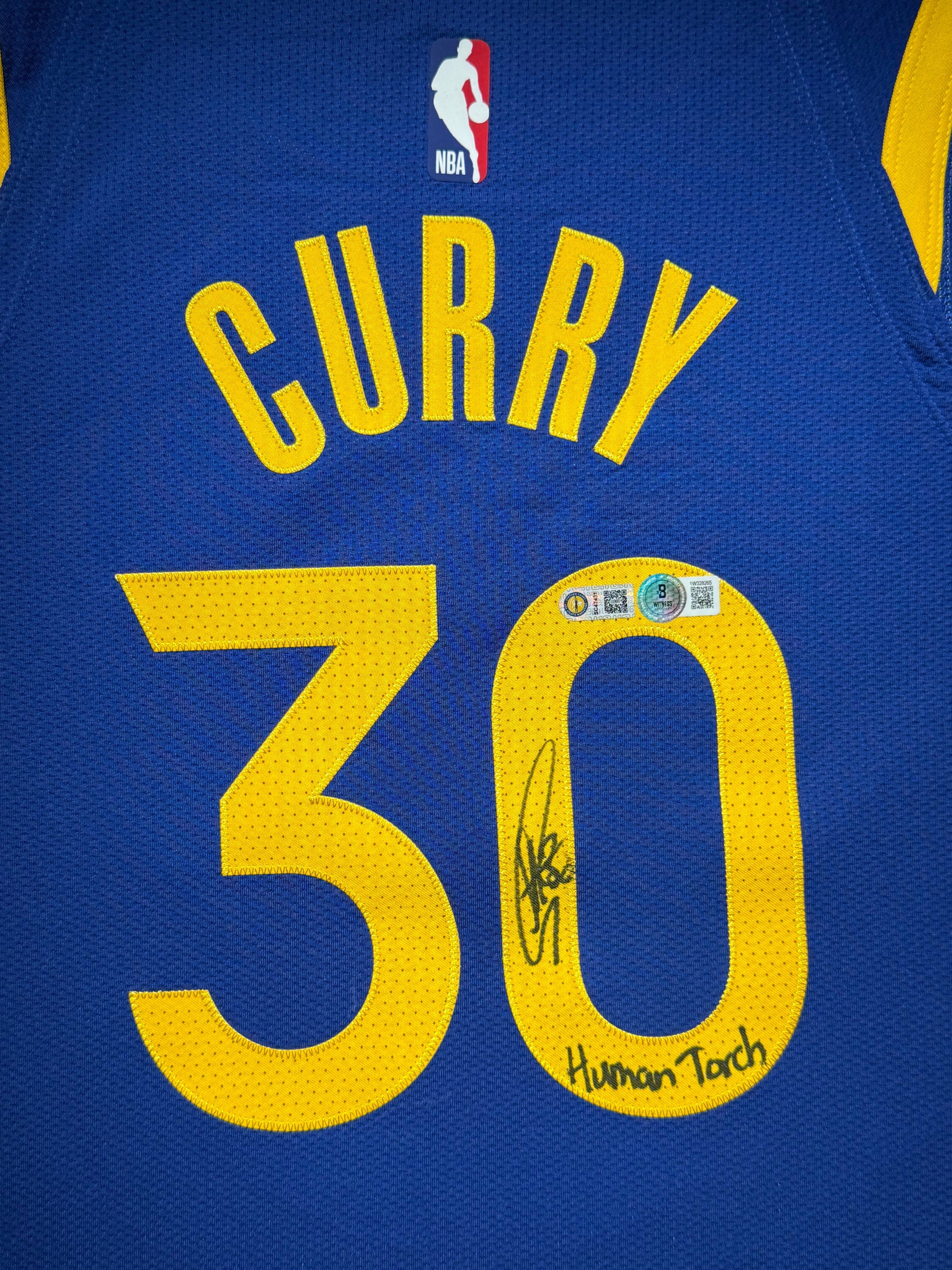 Maillot AuthentiqueGolden Sate Warriors signe "HUMAN TORCH" par Stephen Curry et certifie par Beckett et Stephen Curry authentic-signatures