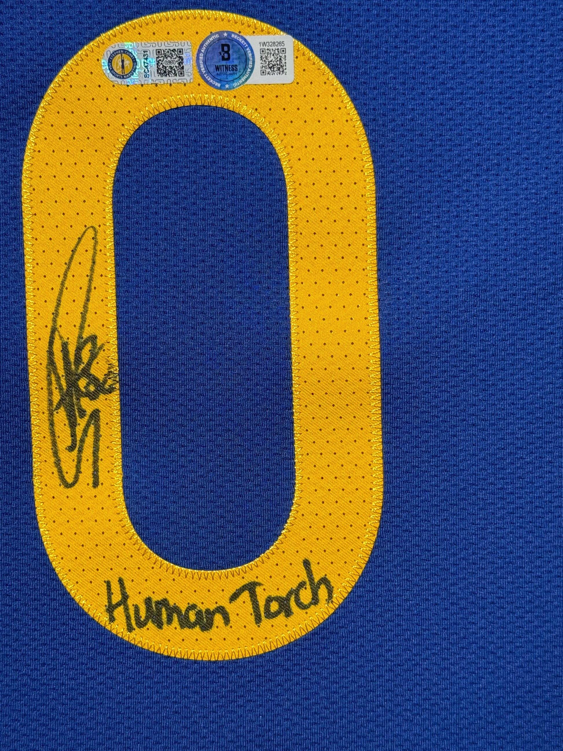 Maillot AuthentiqueGolden Sate Warriors signe "HUMAN TORCH" par Stephen Curry et certifie par Beckett et Stephen Curry authentic-signatures